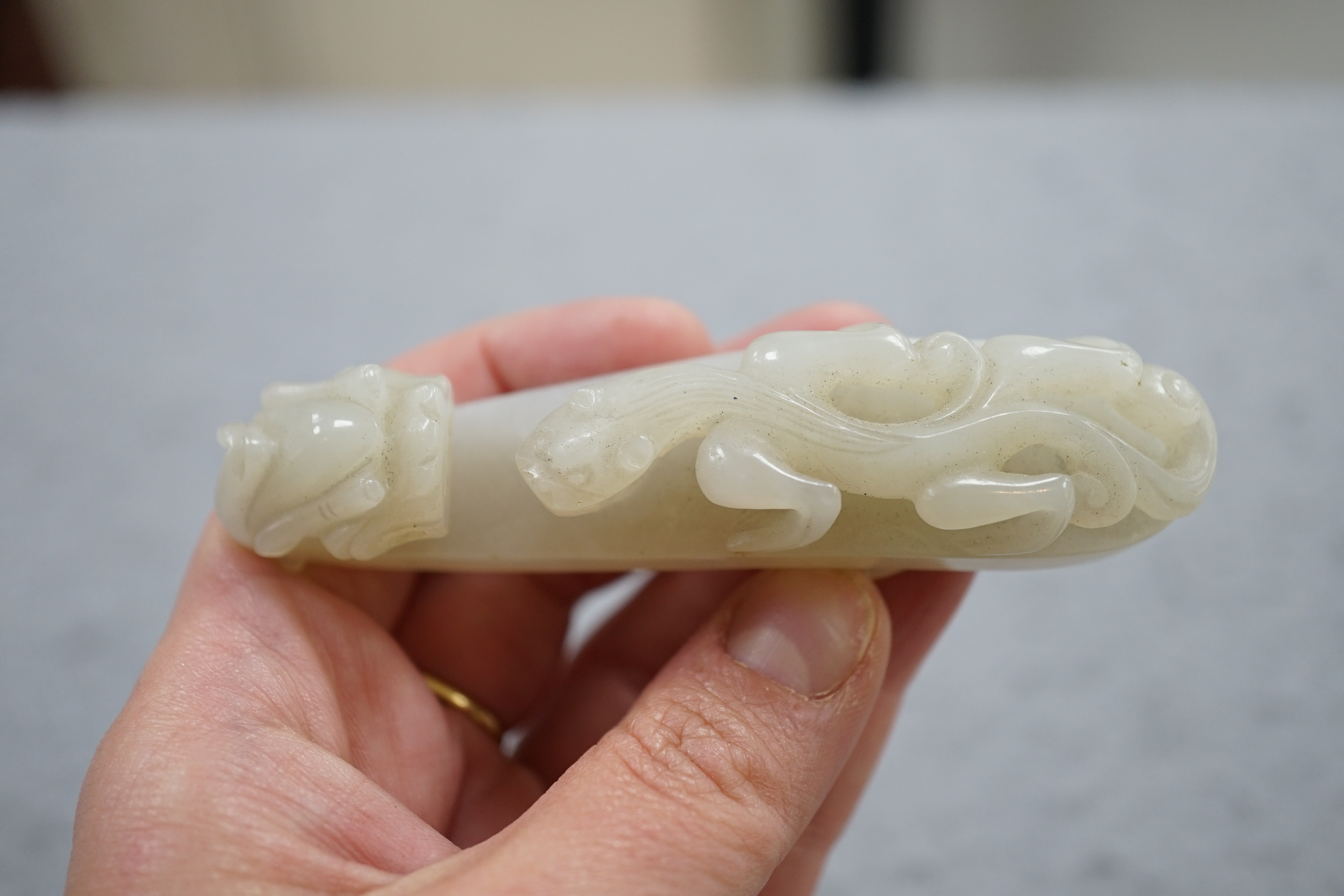 A Chinese white jade ‘dragon’ belt hook, 18th/19th century